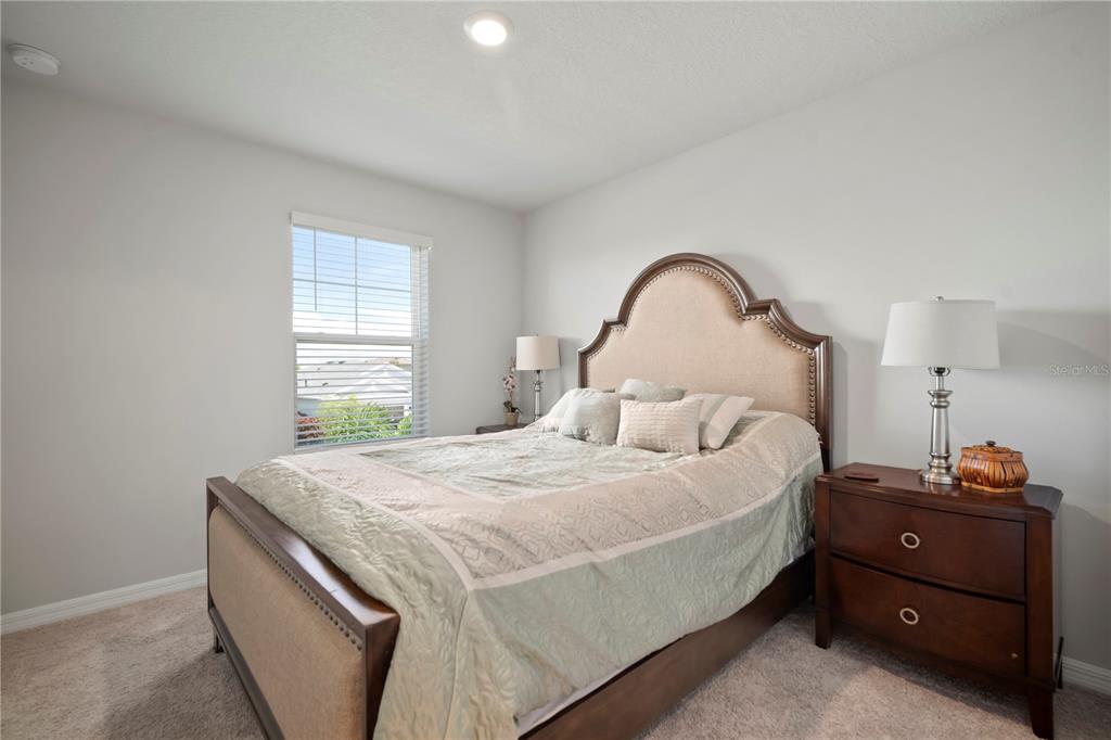 5636 Silver Sun Drive Apollo Beach, FL 33572 - Photo 45 of 61 a bedroom with a bed and a window