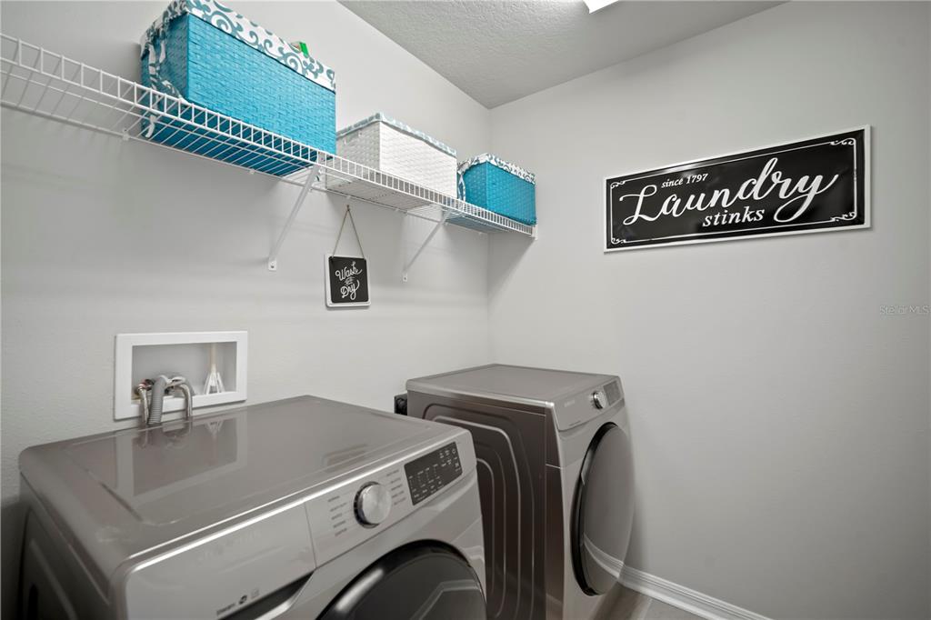 5636 Silver Sun Drive Apollo Beach, FL 33572 - Photo 47 of 61 a utility room with dryer and washer