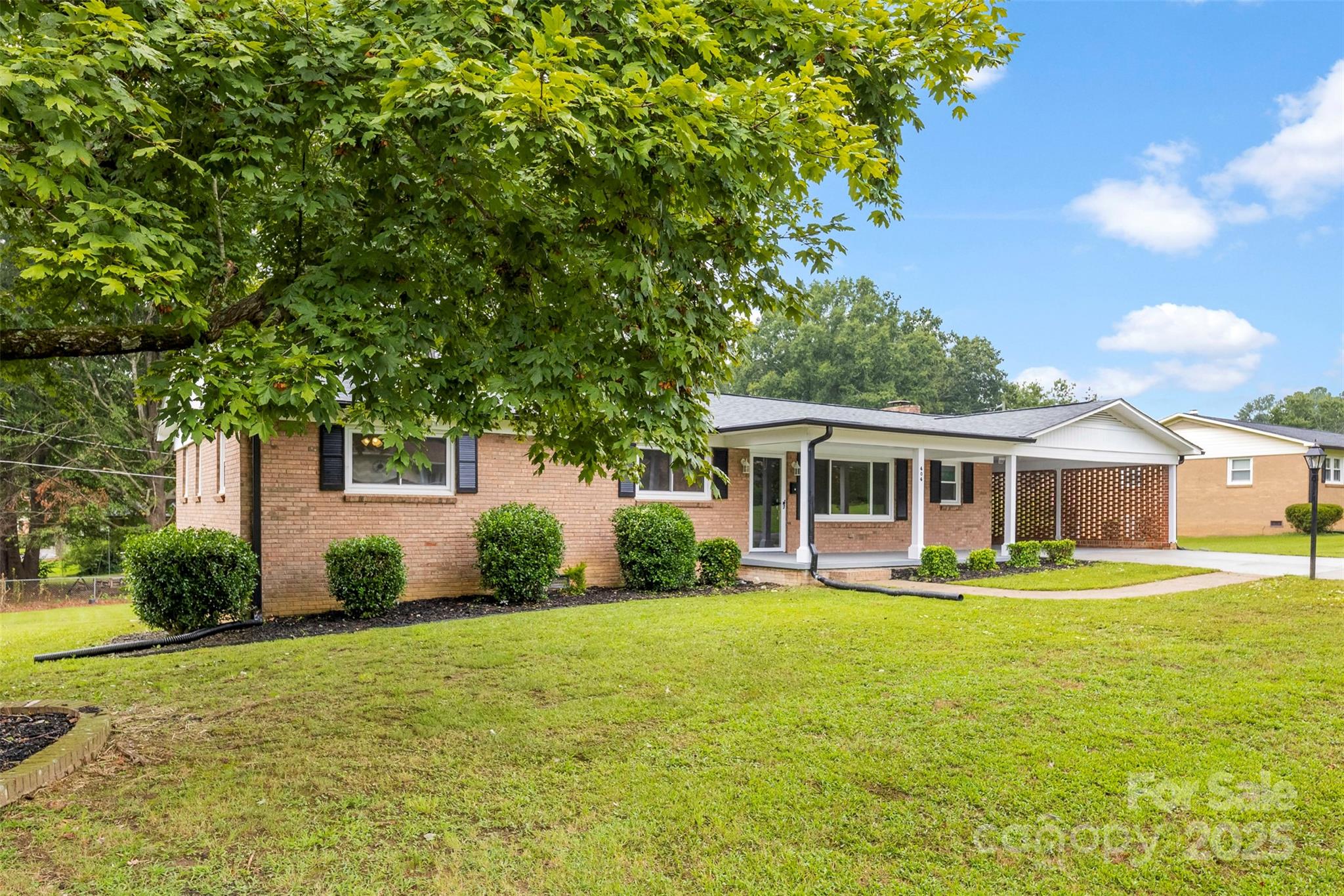 404 Kings Street Cherryville, NC 28021 - Photo 1 of 33 a front view of house with yard and green space