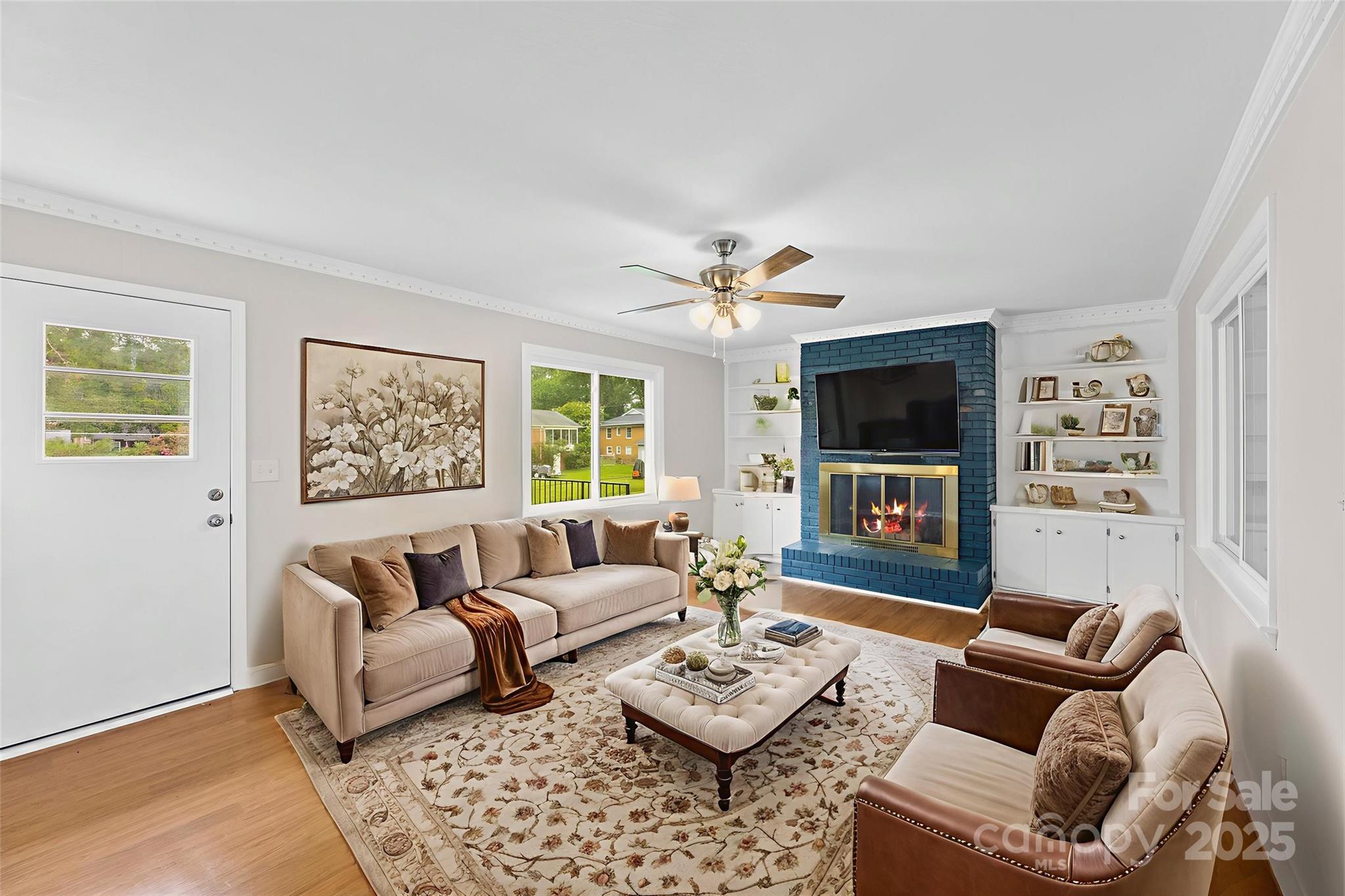 404 Kings Street Cherryville, NC 28021 - Photo 13 of 33 a living room with furniture and a flat screen tv