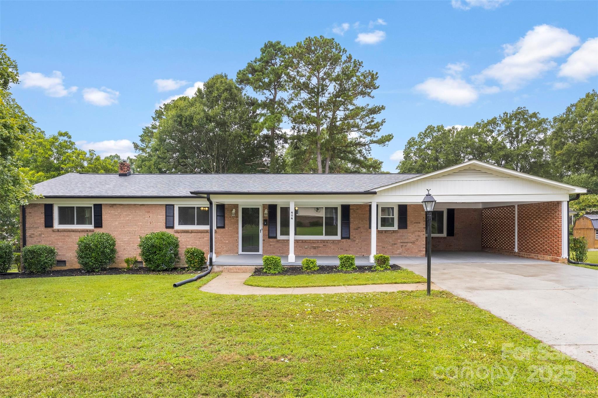404 Kings Street Cherryville, NC 28021 - Photo 2 of 33 a front view of house with yard and glass windows