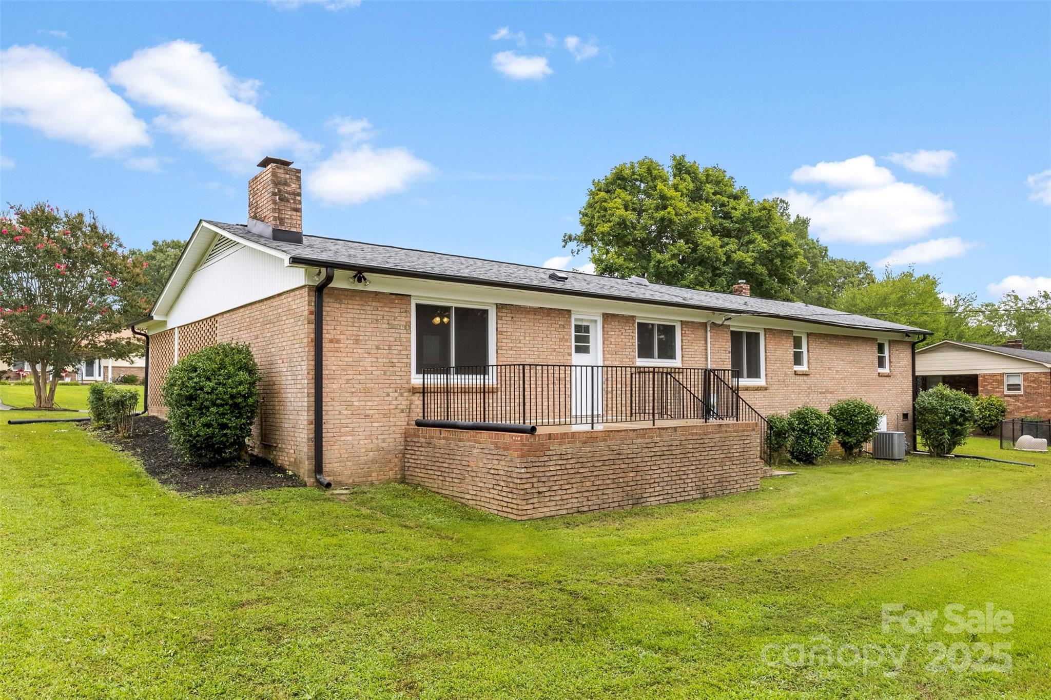404 Kings Street Cherryville, NC 28021 - Photo 29 of 33 a front view of house with yard and green space