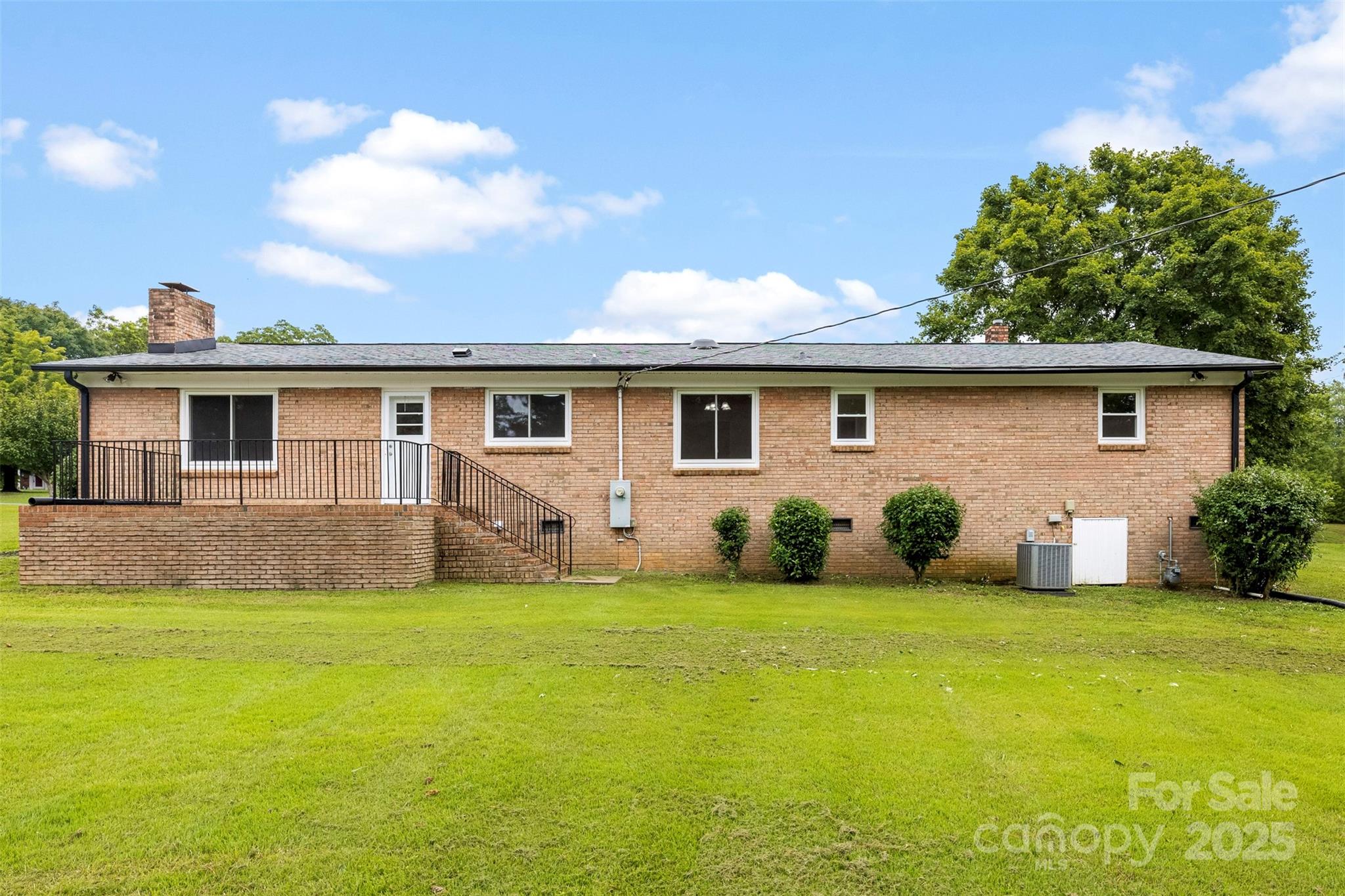 404 Kings Street Cherryville, NC 28021 - Photo 31 of 33 a view of a house with a yard