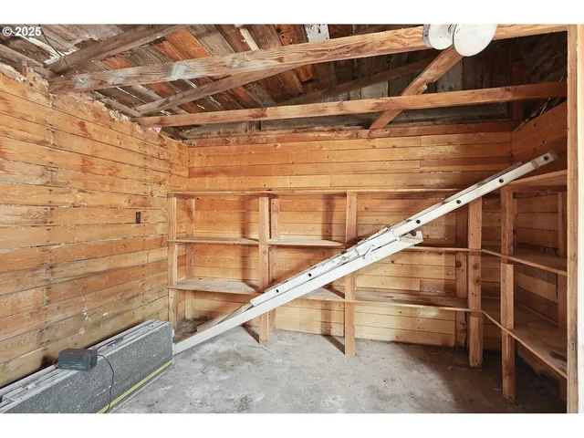 a view of parking garage with cars