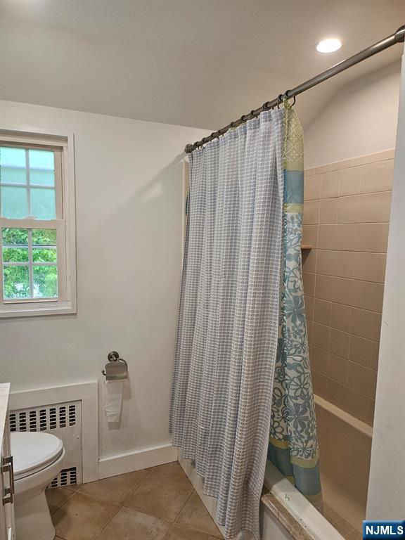 440 Bogert Road River Edge, NJ 07661 - Photo 24 of 25 a bathroom with a shower curtain and a window