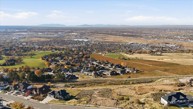 1211 West Fallow Way Ogden, UT 84414 - Photo 13 of 20 Aerial overview of property's location with nearby suburban area and mountains