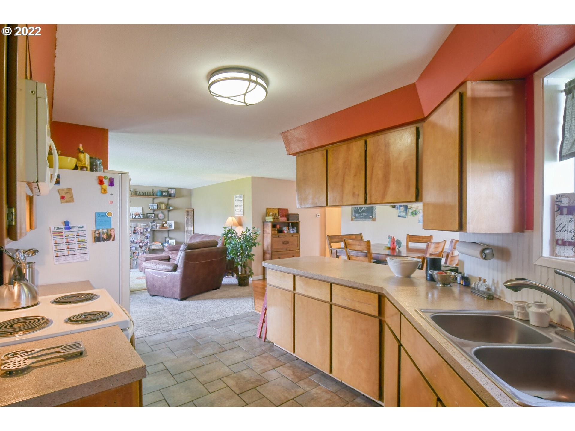 817 Southwest 10th Street Pendleton, OR 97801 - Photo 11 of 25 a kitchen with a sink appliances and cabinets
