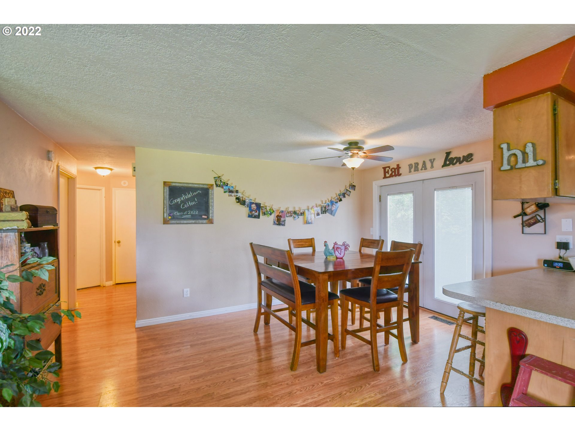 817 Southwest 10th Street Pendleton, OR 97801 - Photo 8 of 25 a view of a dining room with furniture and wooden floor