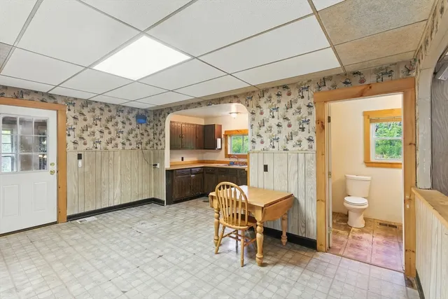 a living room with a couch and a flat screen tv