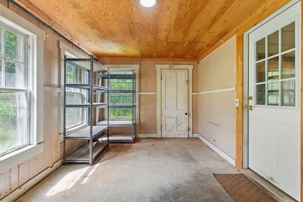 495 Winchendon Road Ashburnham, MA 01430 - Photo 17 of 40 a view of an empty room with a window