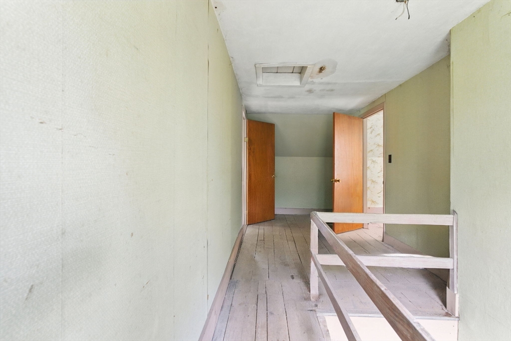 495 Winchendon Road Ashburnham, MA 01430 - Photo 18 of 40 a view of a hallway with wooden floor