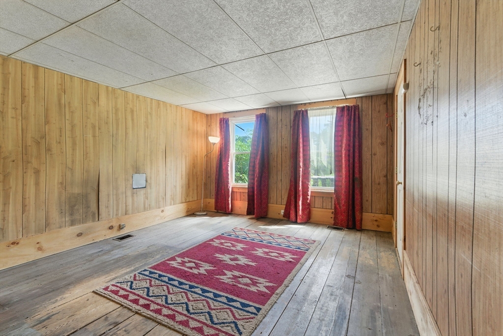 495 Winchendon Road Ashburnham, MA 01430 - Photo 20 of 40 a view of a room with wooden floor and windows