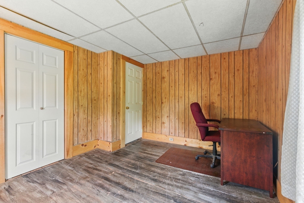 495 Winchendon Road Ashburnham, MA 01430 - Photo 27 of 40 a view of a workspace with furniture and a window