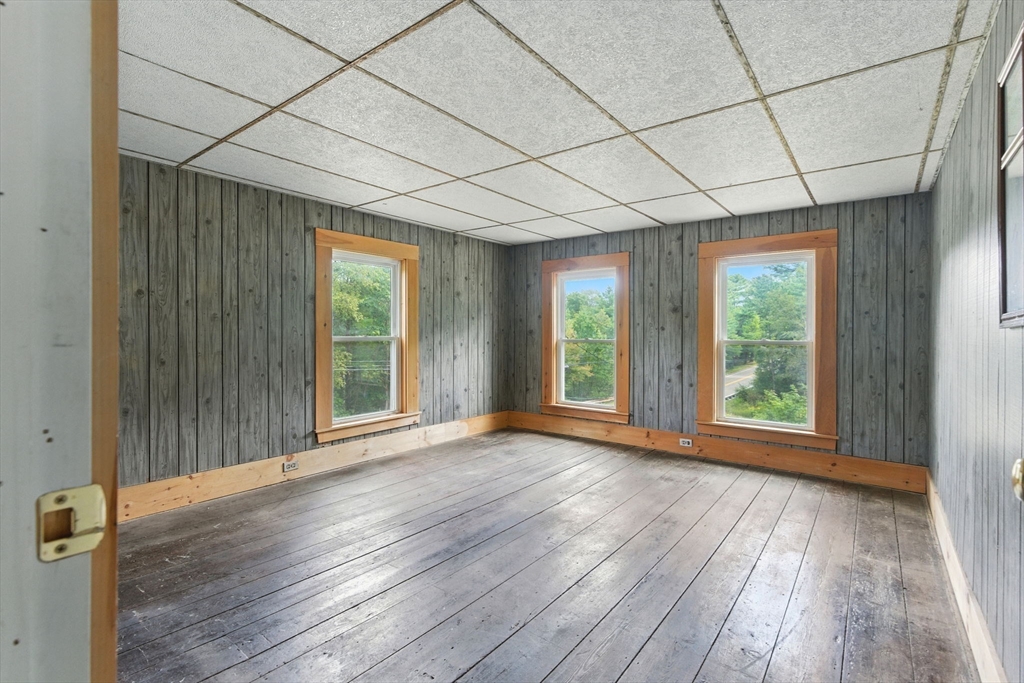 495 Winchendon Road Ashburnham, MA 01430 - Photo 33 of 40 a view of a room with wooden floor and fan