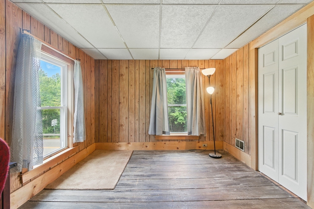 495 Winchendon Road Ashburnham, MA 01430 - Photo 35 of 40 a view of a room with wooden floor and outdoor space