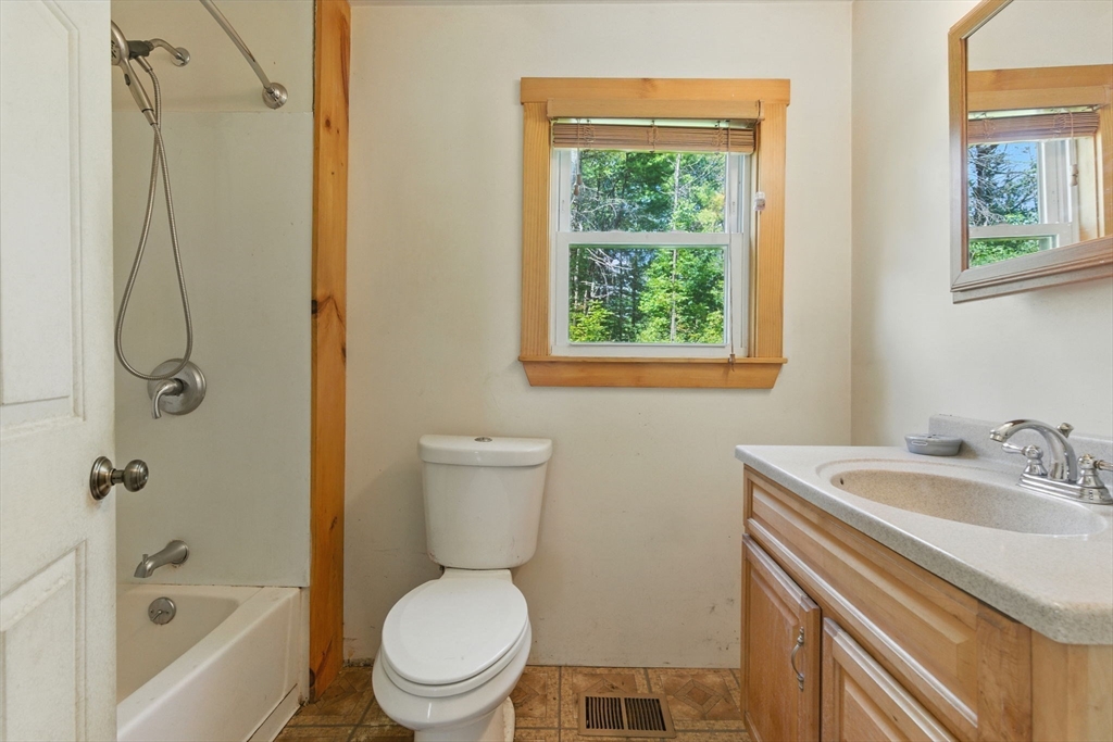 495 Winchendon Road Ashburnham, MA 01430 - Photo 36 of 40 a bathroom with a sink toilet and shower
