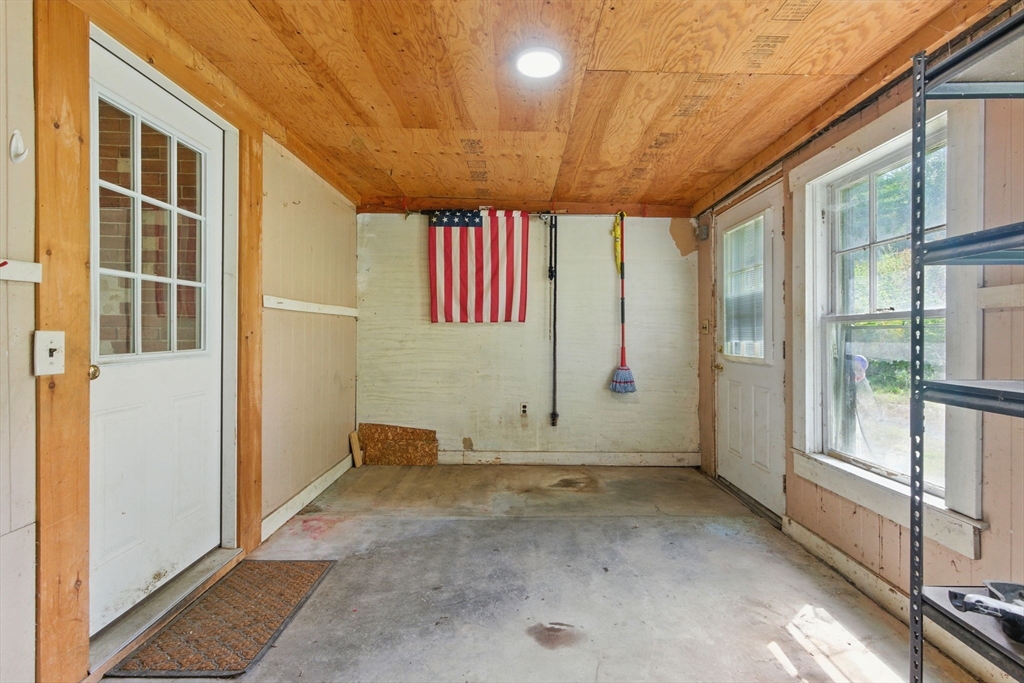 495 Winchendon Road Ashburnham, MA 01430 - Photo 38 of 40 a view of a big room with wooden floor and windows