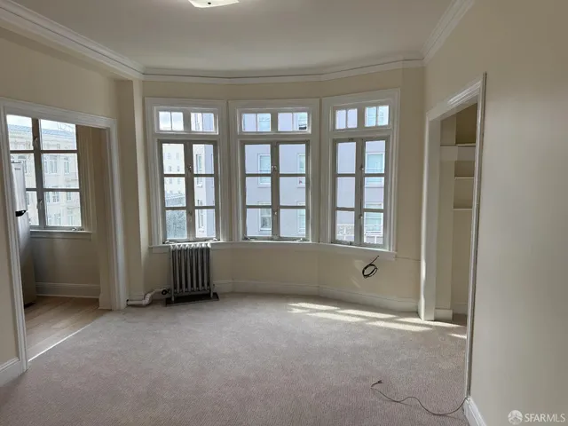 an empty room with windows
