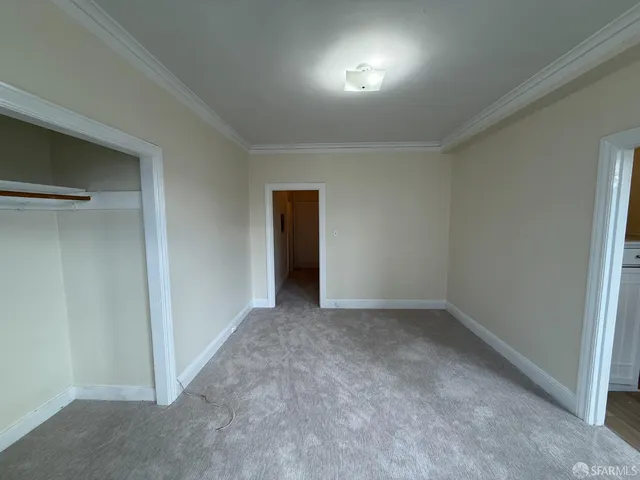 an empty room with an entryway