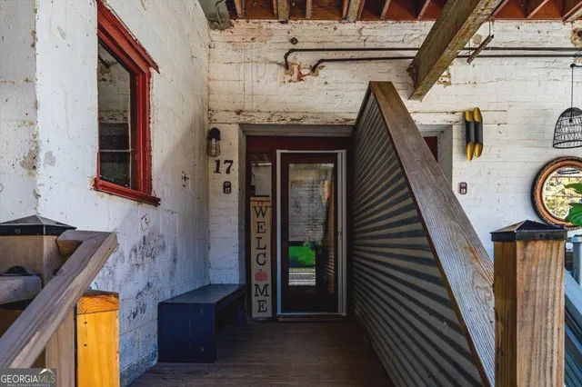 a view of entryway with wooden floor