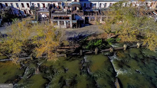 a view of a building with sitting area