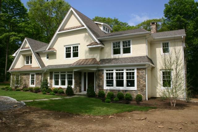 171 Peaceable Ridge Road Ridgefield, CT 06877 - Photo 1 of 1 a front view of a house with a yard