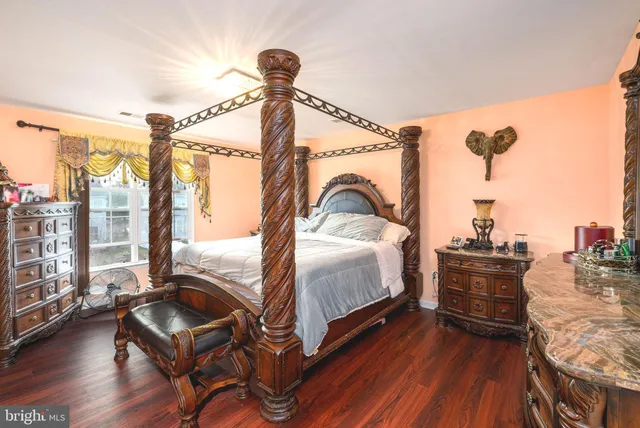 a view of a living room and hardwood floor