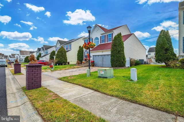 a front view of house with yard