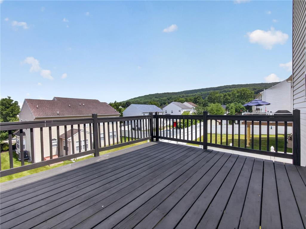 3821 Rittenhouse Road Lower Macungie Township, PA 18062 - Photo 14 of 62 An inviting deck offers scenic views of the rolling hills and surrounding neighborhood.