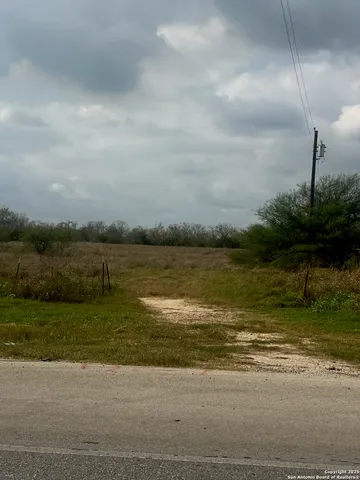 a view of a lake with a big yard