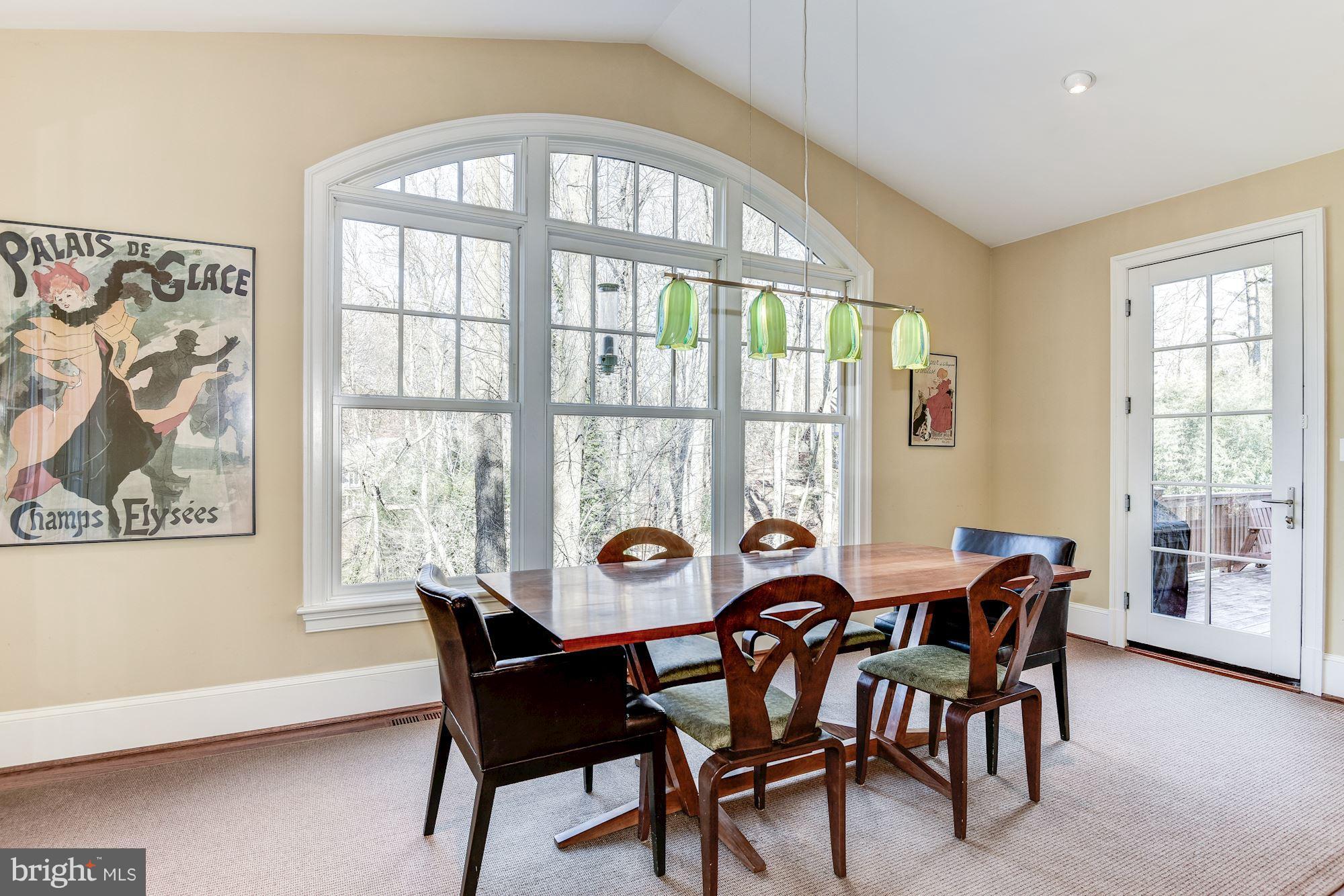 6217 Winnebago Road Bethesda, MD 20816 - Photo 11 of 30 Table Space Kitchen Open to Deck and Screened Porc