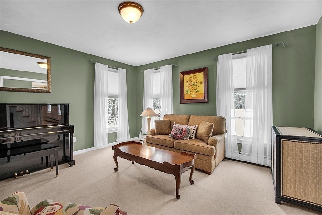 6 Fitch Farm Road Sterling, MA 01564 - Photo 15 of 41 a living room with furniture and a flat screen tv