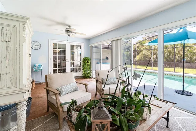 a view of a livingroom with furniture and garden