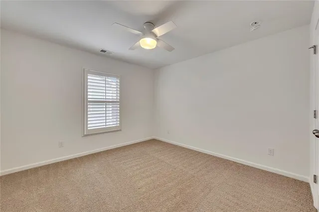 swimming pool view with a sitting space