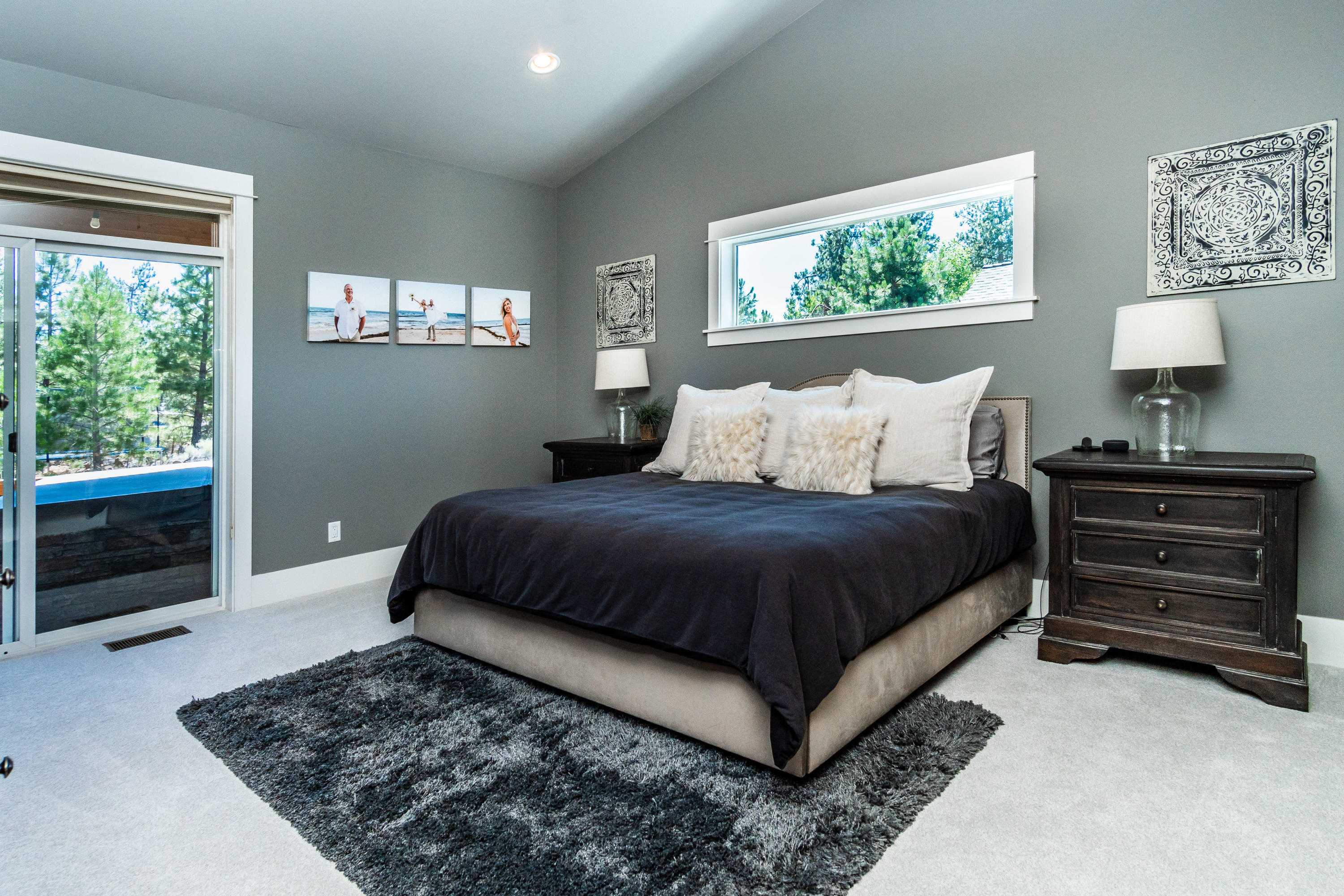 19525 Apache Road Bend, OR 97702 - Photo 15 of 47 a bedroom with a bed and a window