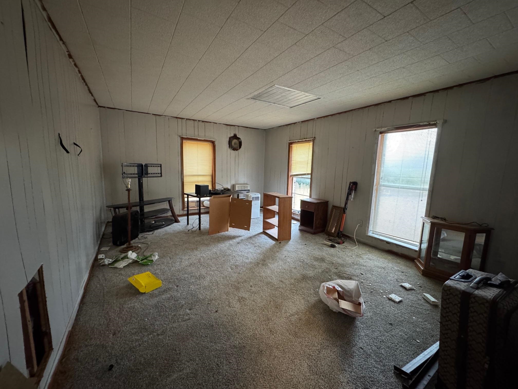 5893 Brighton-Clopton Road Brighton, TN 38011 - Photo 12 of 14 a living room with furniture and a flat screen tv