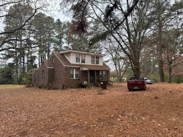 a car parked in front of a house