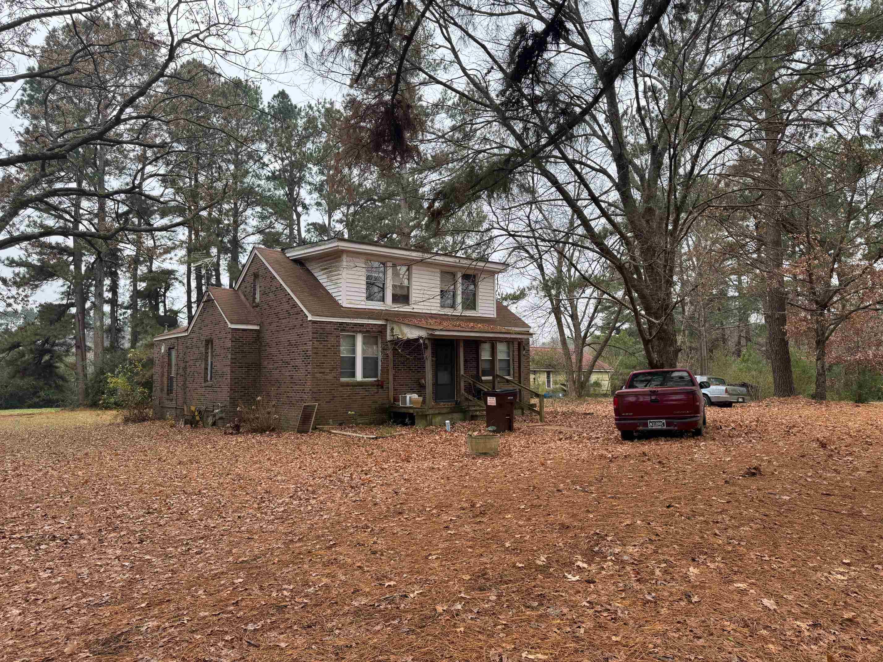 5893 Brighton-Clopton Road Brighton, TN 38011 - Photo 2 of 14 a car parked in front of a house