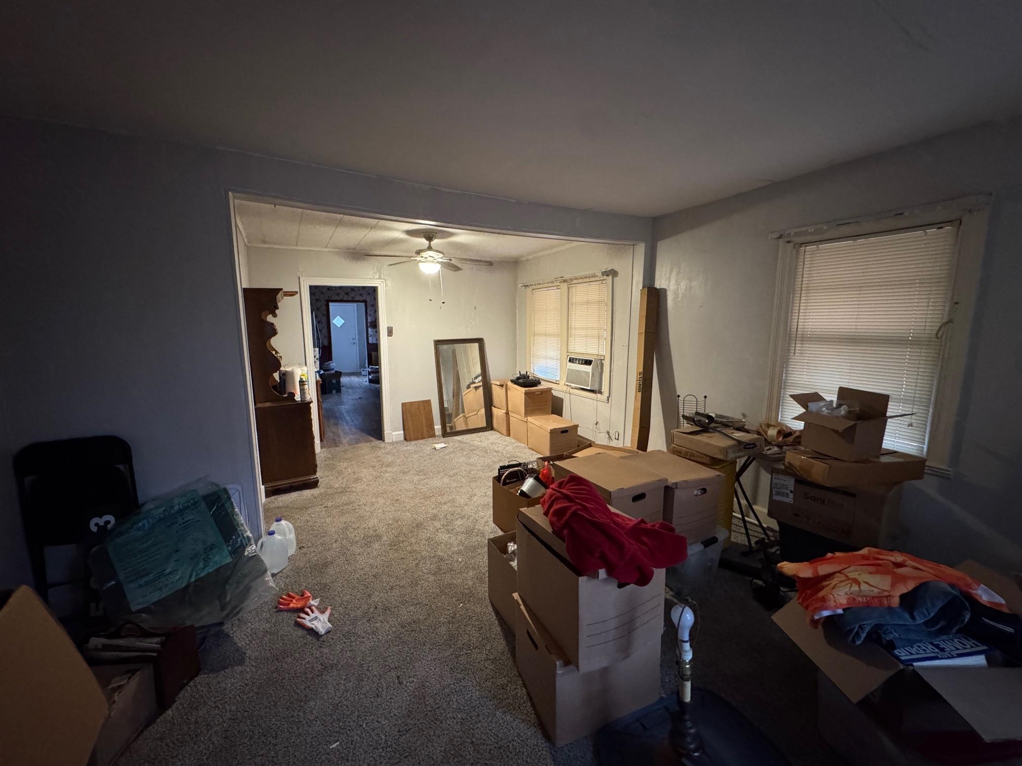 5893 Brighton-Clopton Road Brighton, TN 38011 - Photo 6 of 14 a living room with furniture and a wooden floor