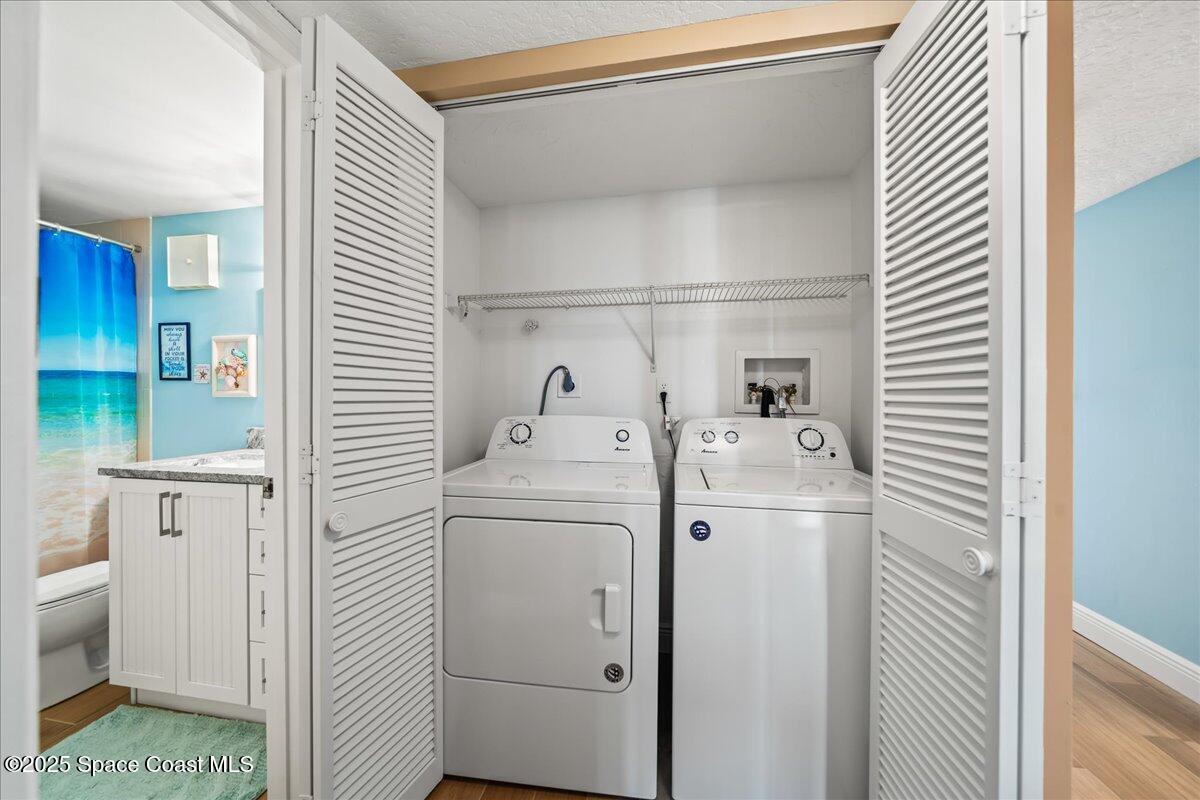 3220 River Villa Way, Unit 151 Melbourne Beach, FL 32951 - Photo 34 of 51 a utility room with dryer and washer