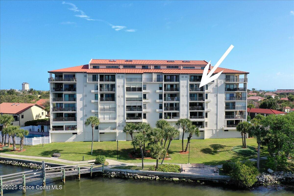 3220 River Villa Way, Unit 151 Melbourne Beach, FL 32951 - Photo 4 of 51 a view of house with swimming pool and outdoor seating