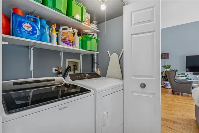a utility room with dryer and washer