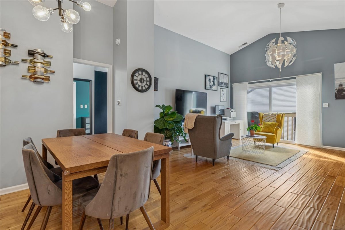 1321 Longacre Lane Wheeling, IL 60090 - Photo 9 of 23 a view of a dining room with furniture and wooden floor