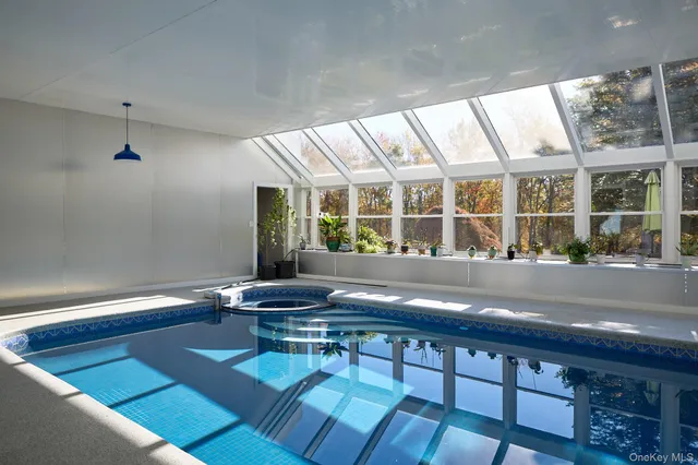 a living room with a table and window