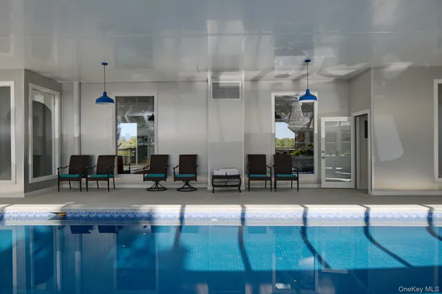 a kitchen with cabinets and window