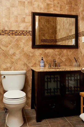 a bathroom with a toilet and a sink