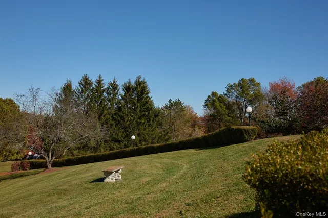 a view of lake with green space