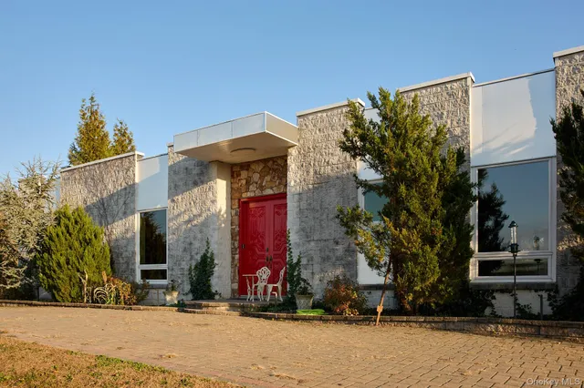 front view of a house with a street