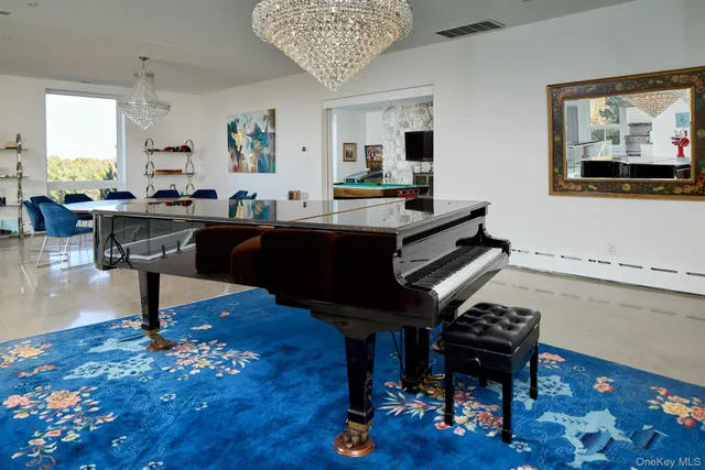 a living room with furniture and a table