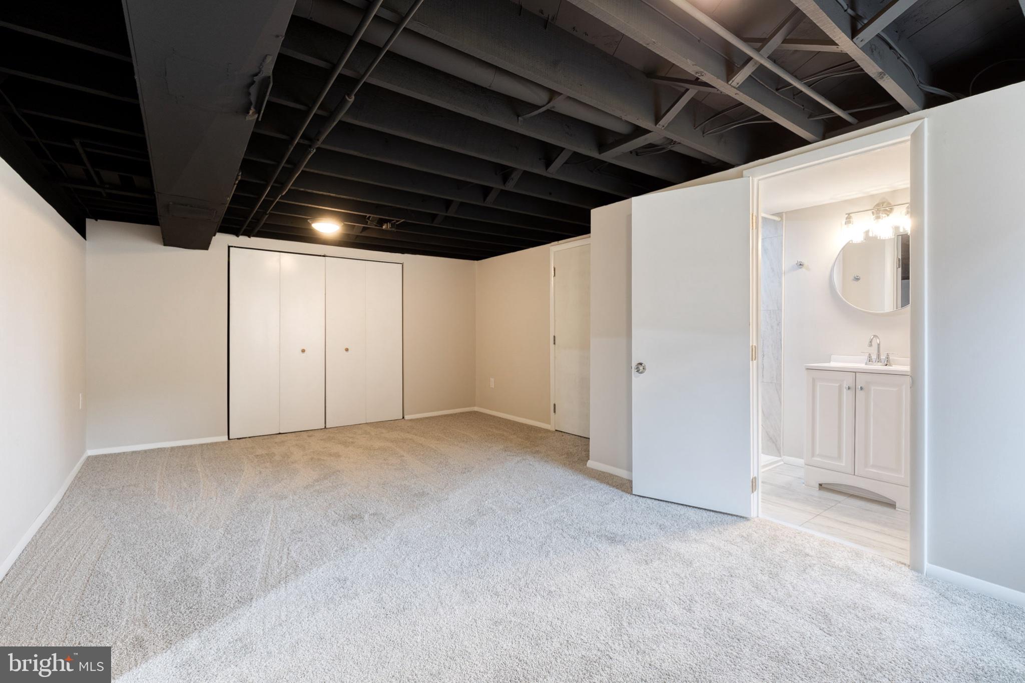 8306 Berkfield Road Baltimore, MD 21237 - Photo 20 of 29 Spacious, versatile basement retreat.